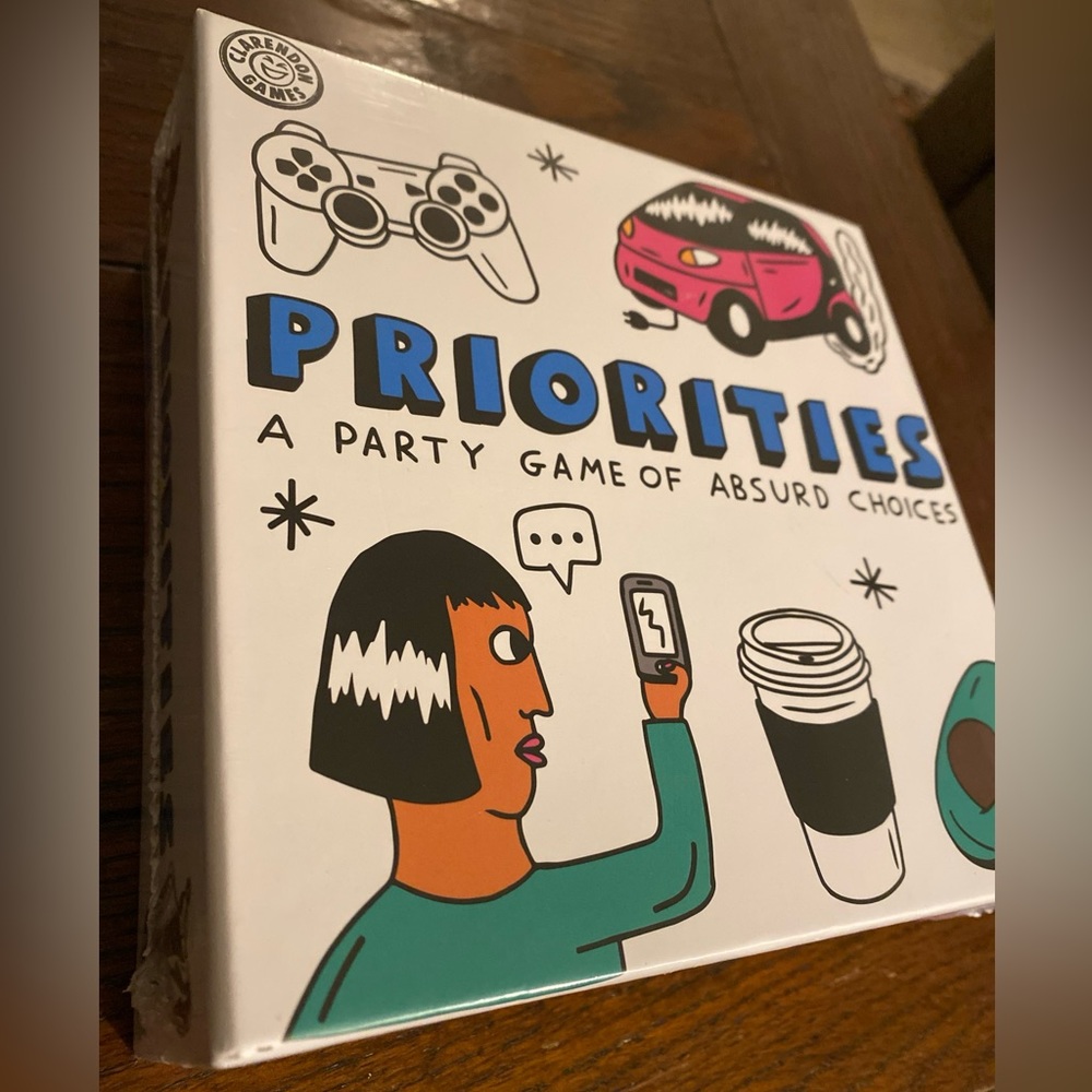 Priorities: A Party Game of Absurd Choices For Adults & Teenagers. (New)